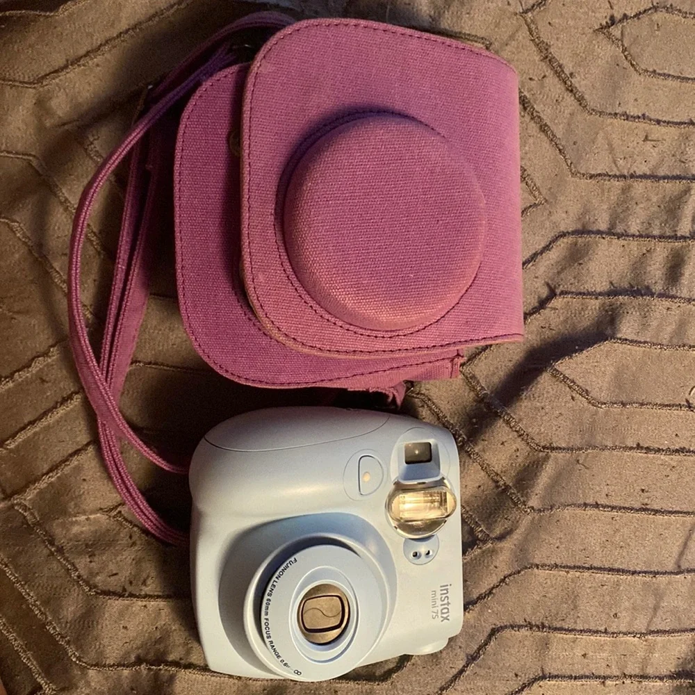 Blue instax camera with purple case